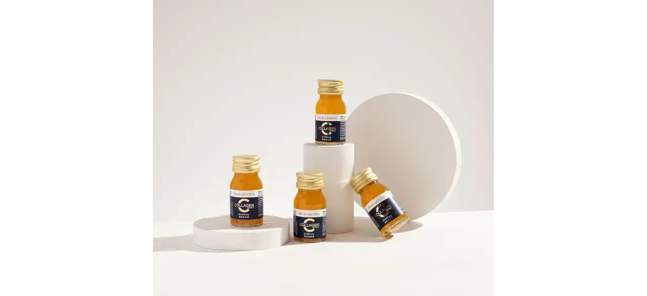 Collagen sport supplement bottles arranged on white background